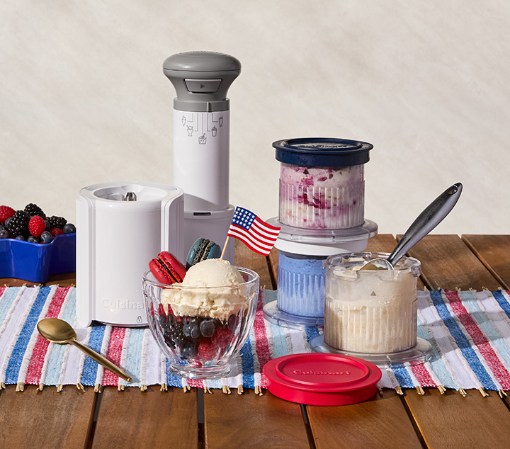 ice cream maker with containers of ice cream and a bowl.